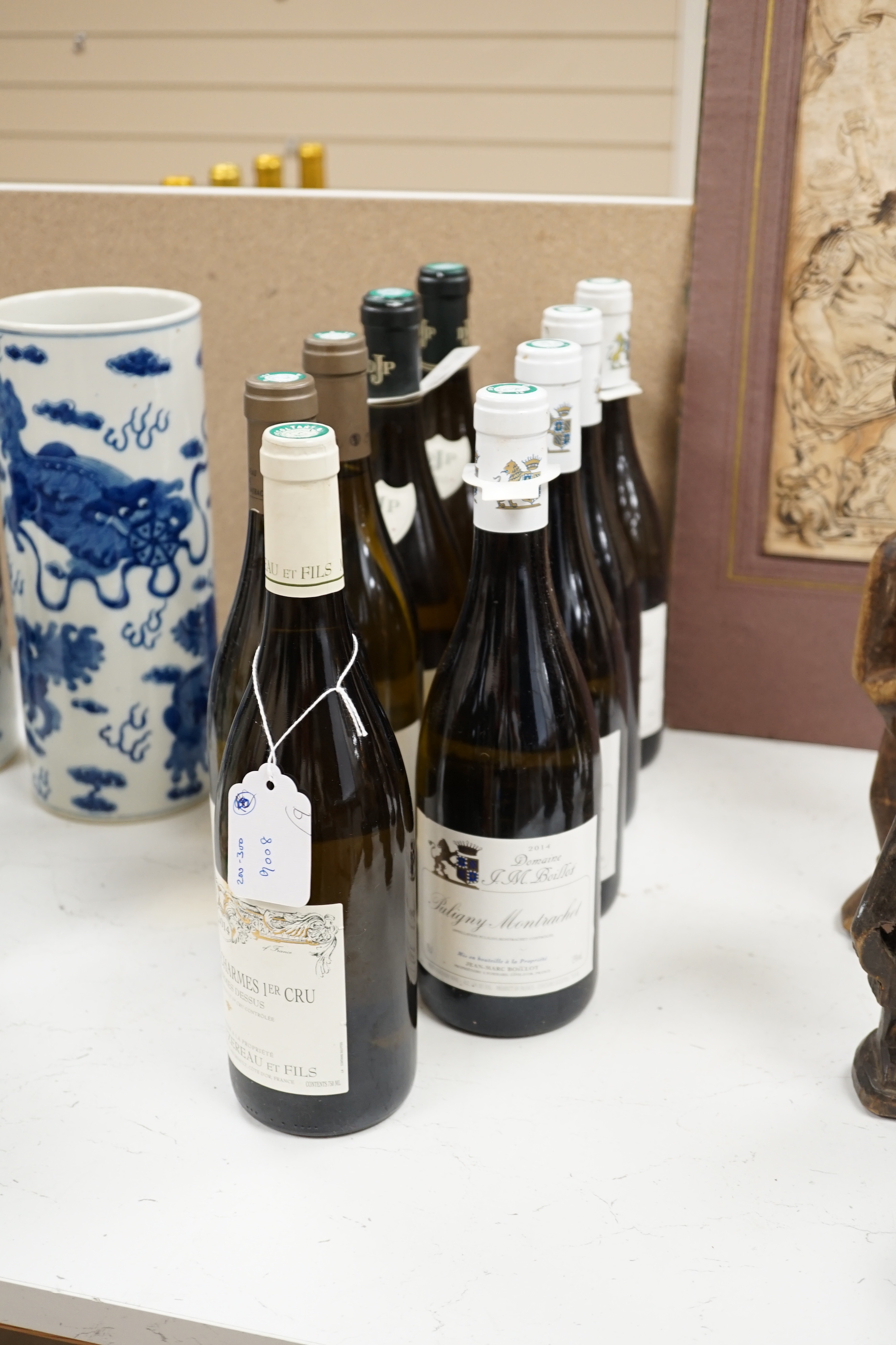 One bottle of Meursault-Charmes premier cru, les Charmes dessus 2014, two bottles of Chassagne Montrachet, Chateau de Puligny-Montrachet 2013, two bottles of Couton-Charlemagne grande cru 2011 and four bottles of Puligny